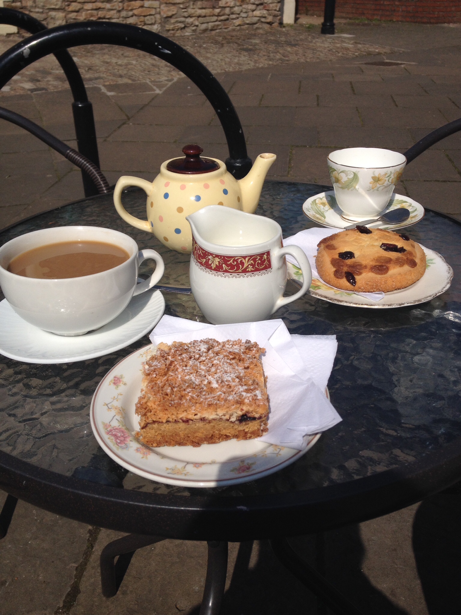 Enjoying drinks and cakes outside Donnies Cafe, Magor