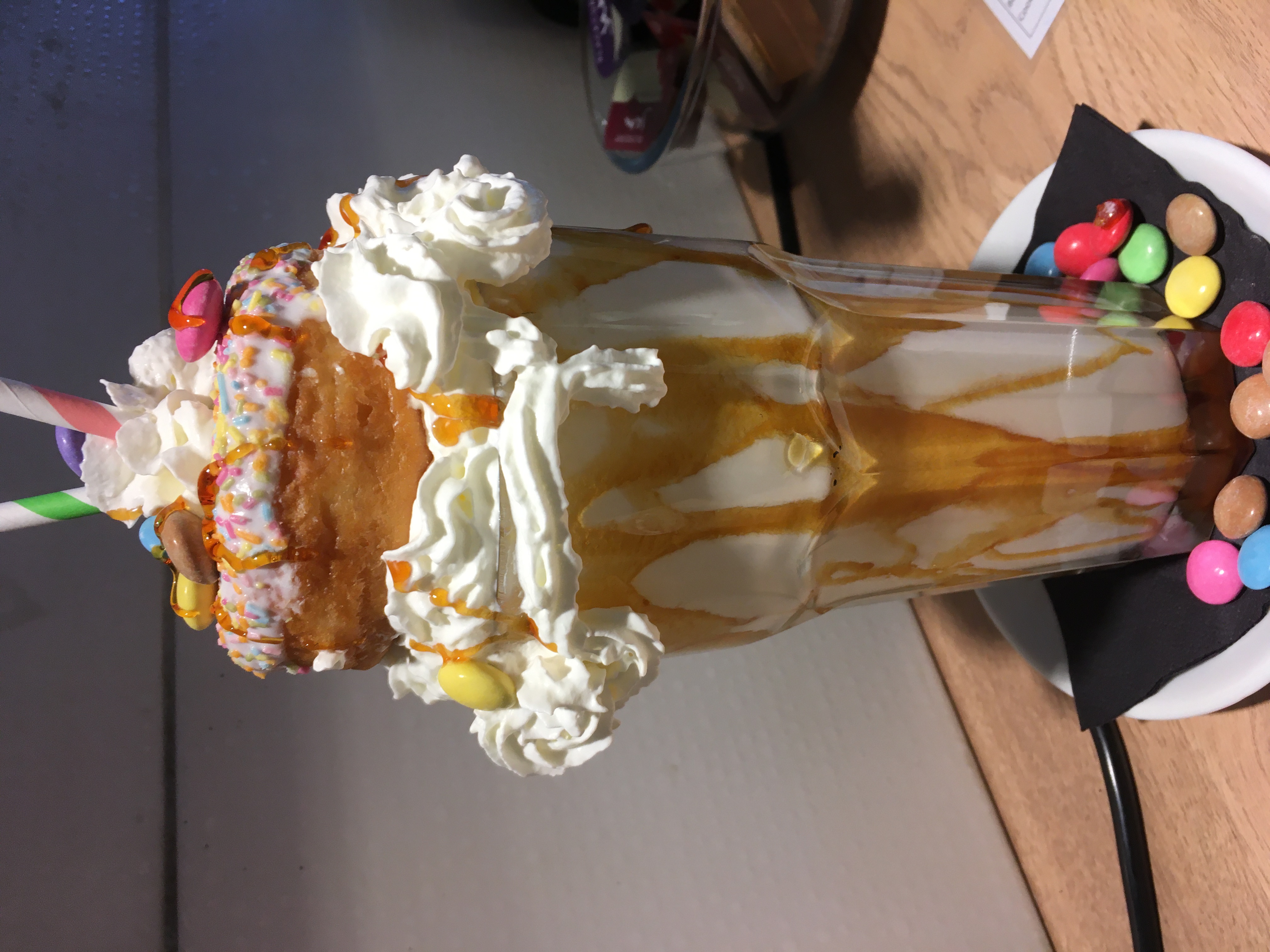 Monster Milkshake with vanilla shake, smarties and doughnut. 
